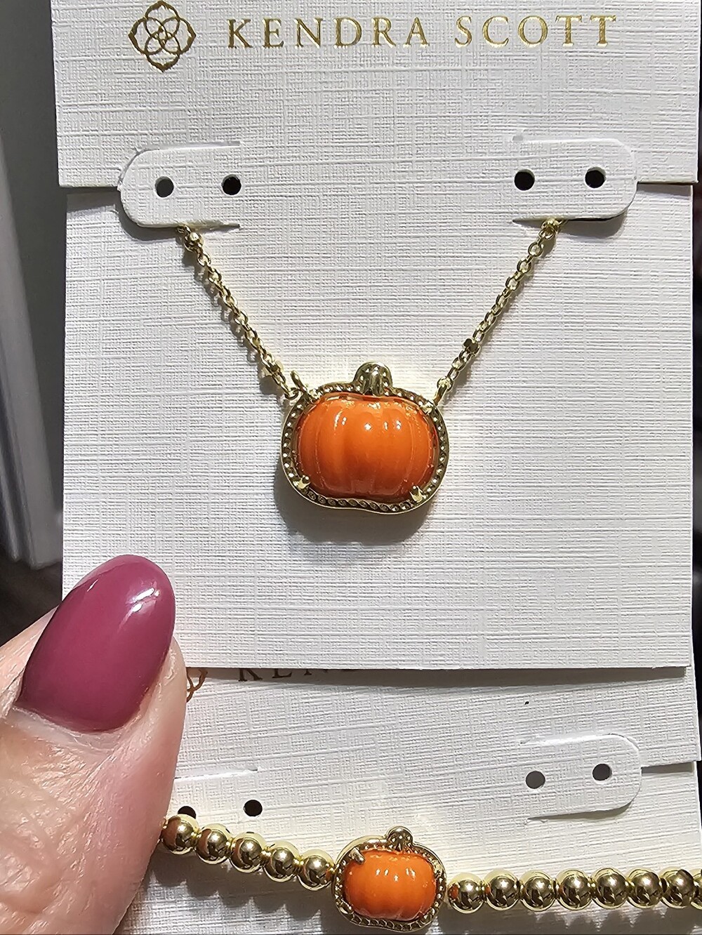 Kendra Scott Gold Necklace and Bracelet Set with Orange Pumpkin Charms